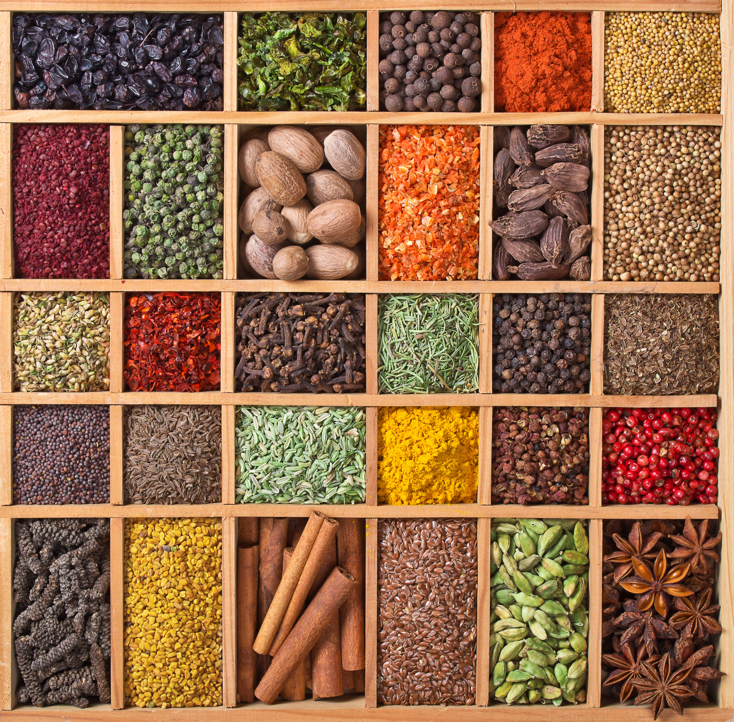 wooden box with spices and herbs